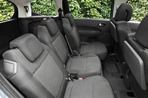 Looking for cheap way to carry three kids in the back.
