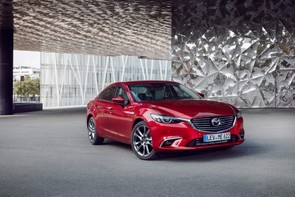 Older premium car or newer Mazda?