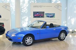 Looking for a sporty auto Mazda...